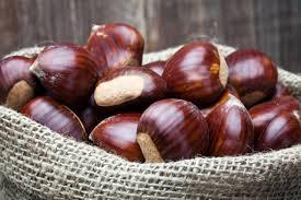 Castagne di Calabria in a burlap sack, energy-rich, gluten-free snack, organic and high in fiber.