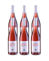 Four bottles of Masseria San Francesco Donna Rosa 0.75 cl IGT Calabria Rosato wine with a pink hue.