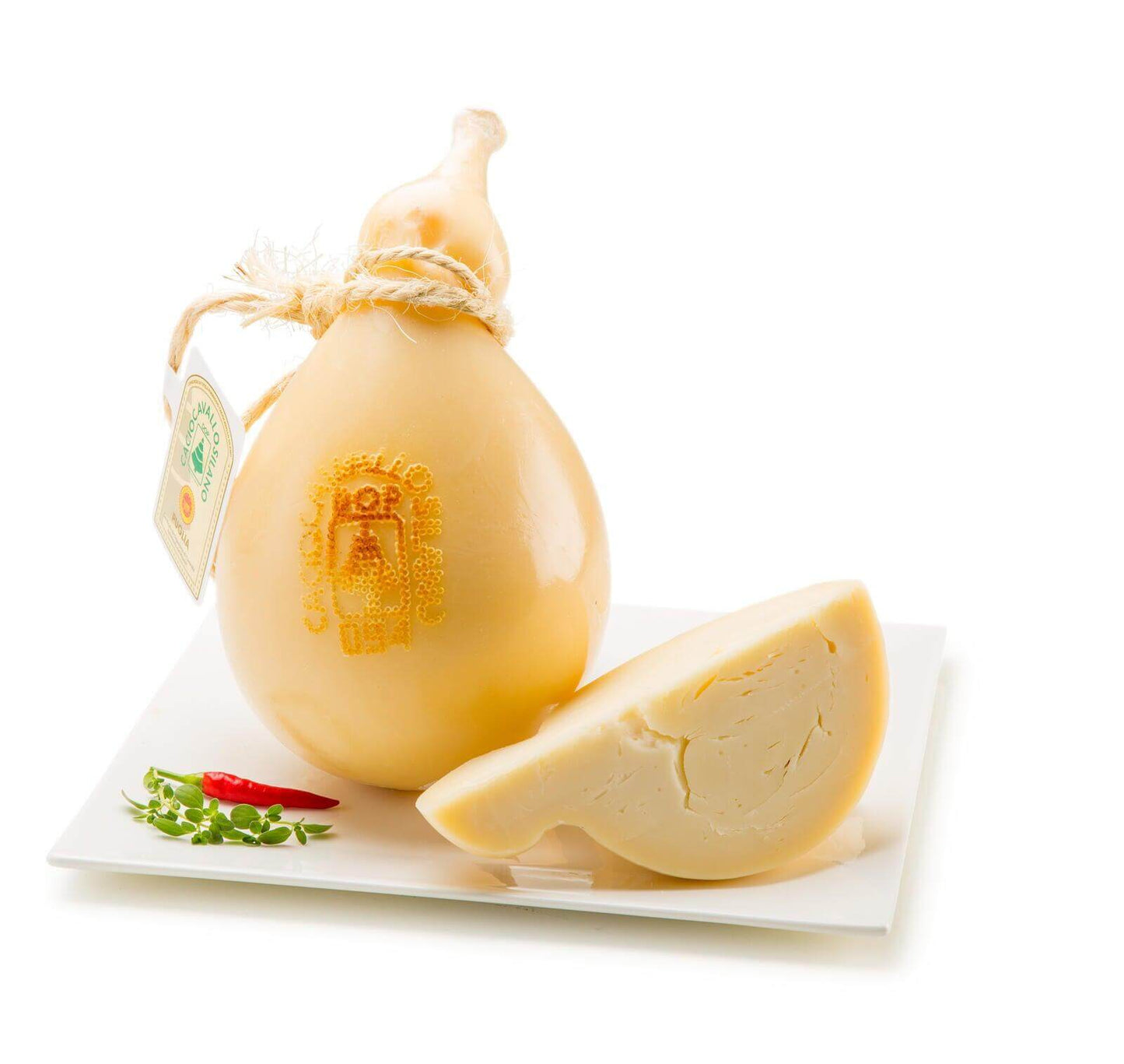 Caciocavallo Silano DOP cheese, semi-aged, buttery flavor, pear-shaped, with smooth rind and mold, served on a plate.