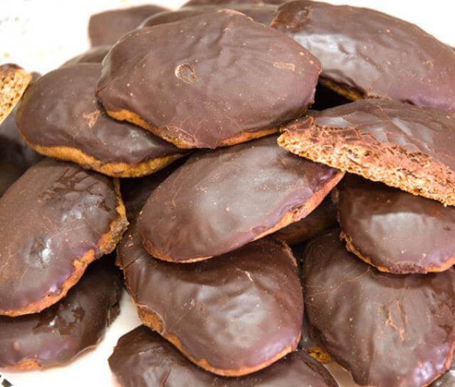 Delicious Susumelle calabresi dolcetti secchi tipici della calabria covered in chocolate glaze.