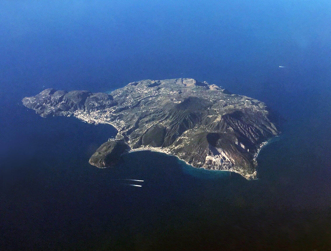 Aerial view of Lipari island, showcasing its lush terrain and surrounding blue waters.