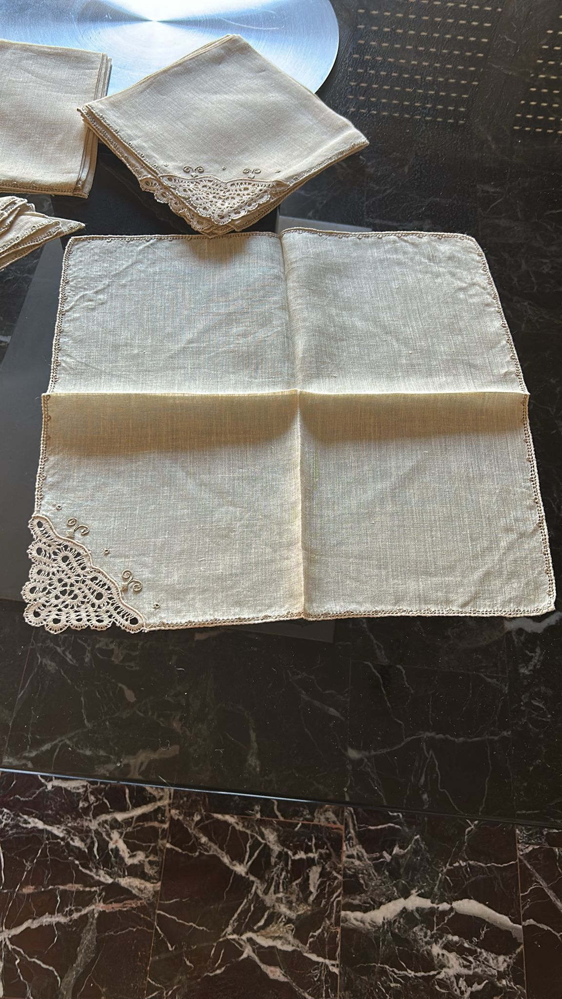 Antique Burano table napkin with lace trim, handcrafted in Italy, perfect for special events or elegant dining.