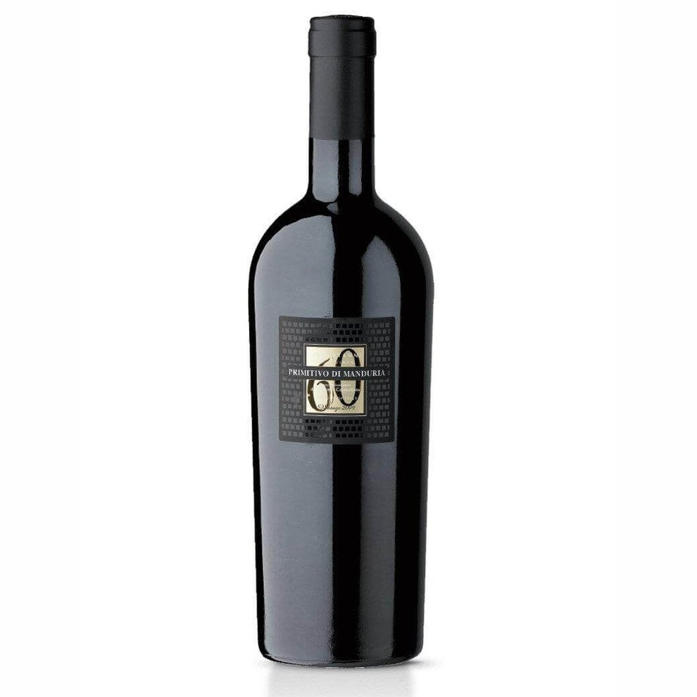 Bottle of Vino Rosso - Primitivo di Manduria DOP Feudo San Marzano, elegant ruby red wine.